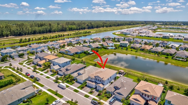 5968 Jasmine Ln, Westlake, FL 33470 - aerial perspective of suburban area with a large body of water