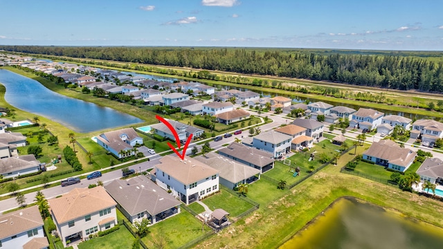 5968 Jasmine Ln, Westlake, FL 33470 - aerial view of residential area with a large body of water and a heavily wooded area