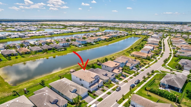5968 Jasmine Ln, Westlake, FL 33470 - aerial perspective of suburban area featuring a large body of water