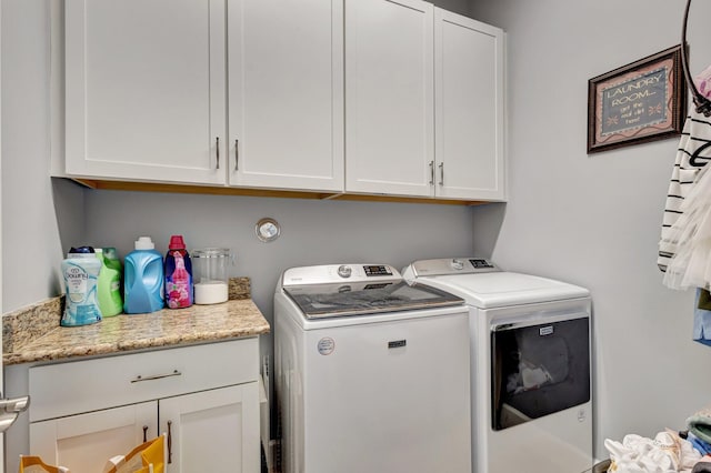 5968 Jasmine Ln, Westlake, FL 33470 - laundry area with independent washer and dryer and cabinet space