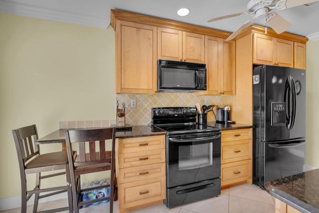 kitchen with black appliances, a ceiling fan, dark stone counters, decorative backsplash, and recessed lighting