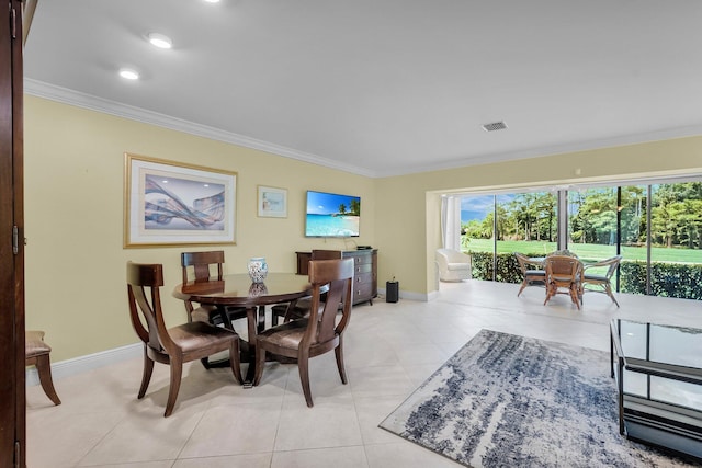 dining space featuring ornamental molding, baseboards, light tile patterned flooring, and recessed lighting