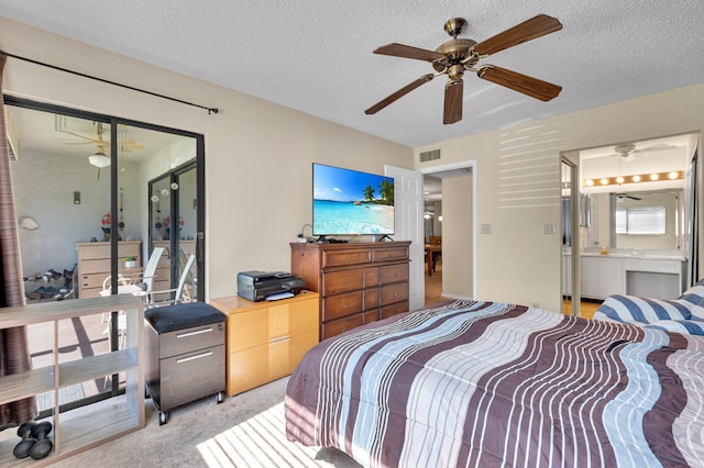 bedroom with a textured ceiling, access to exterior, light colored carpet, and a ceiling fan