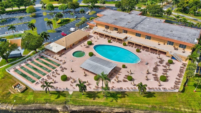 drone / aerial view of a pool