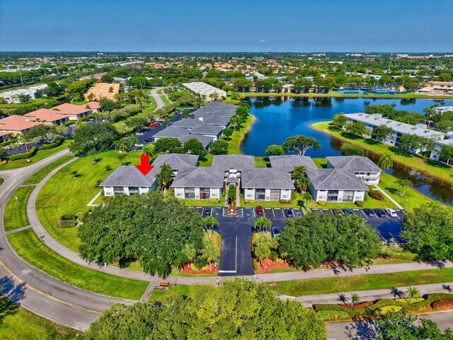 aerial perspective of suburban area featuring a large body of water