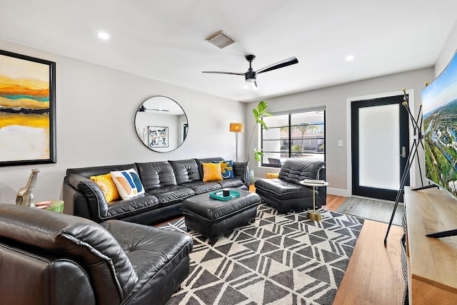 1613 N J Ter, Lake Worth Beach, FL 33460 - living area with wood finished floors, ceiling fan, and recessed lighting