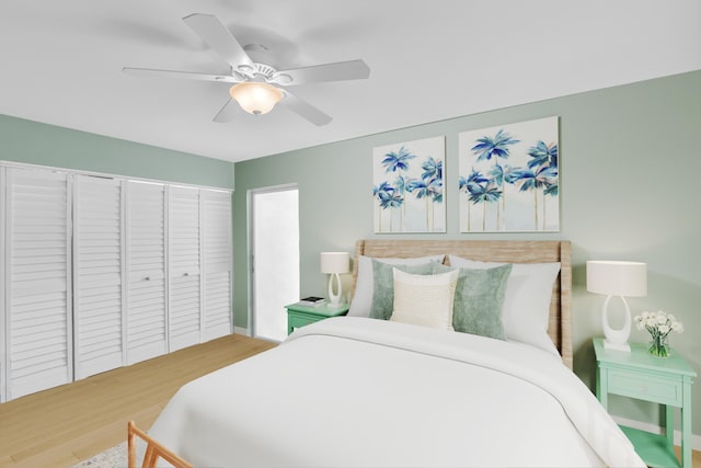 79 Saxony B B, Delray Beach, FL 33446 - bedroom featuring wood finished floors, a closet, and ceiling fan
