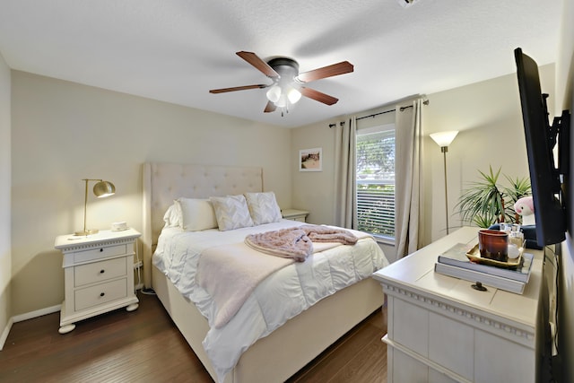 10687 Katmandu Ct, Boynton Beach, FL 33437 - bedroom with dark wood finished floors, ceiling fan, and baseboards