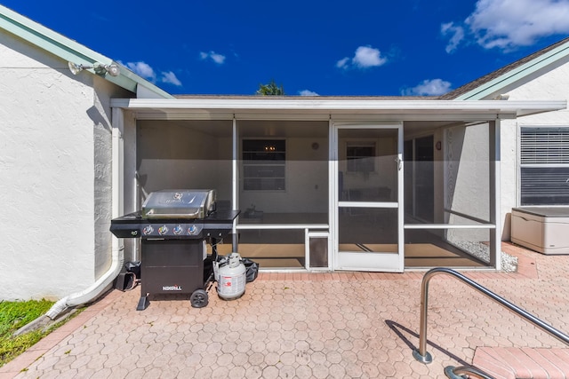 10687 Katmandu Ct, Boynton Beach, FL 33437 - view of patio with a sunroom and area for grilling