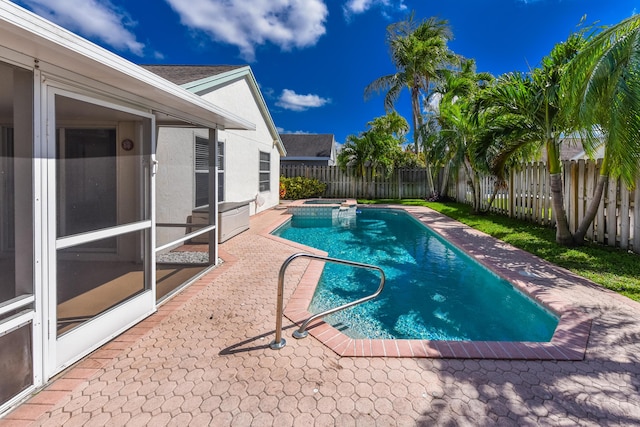 10687 Katmandu Ct, Boynton Beach, FL 33437 - view of swimming pool featuring a fenced backyard, a pool with connected hot tub, and a patio area