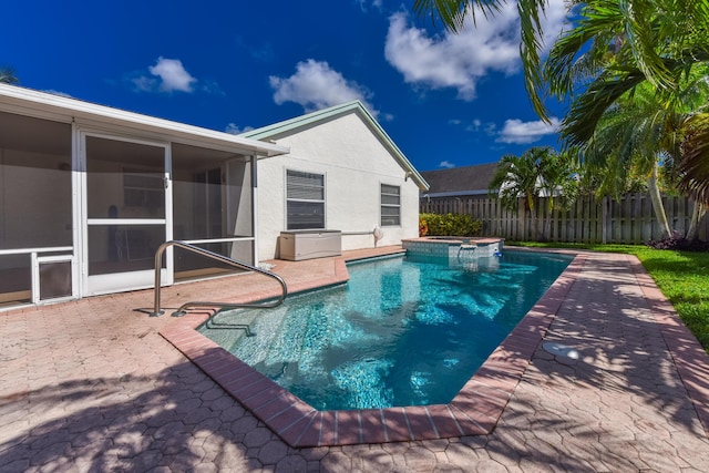 10687 Katmandu Ct, Boynton Beach, FL 33437 - view of pool with a sunroom, a patio area, and a pool with connected hot tub