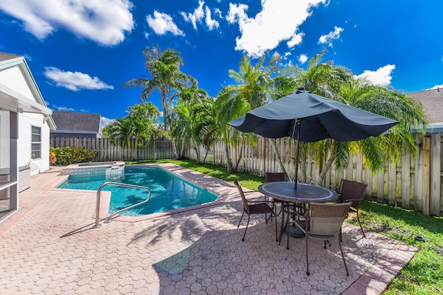 10687 Katmandu Ct, Boynton Beach, FL 33437 - view of swimming pool featuring a patio, a fenced backyard, and outdoor dining space
