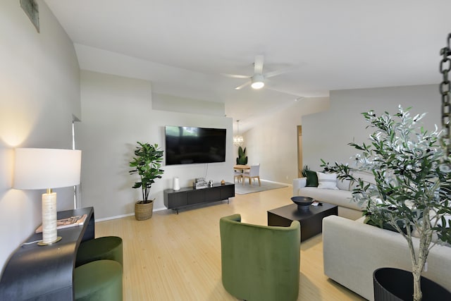 10687 Katmandu Ct, Boynton Beach, FL 33437 - living room featuring lofted ceiling, a ceiling fan, wood finished floors, and baseboards
