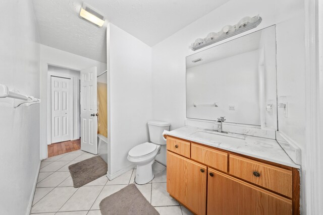 5910 NW Bayou Ct, Port Saint Lucie, FL 34986 - full bath with vanity, toilet, tile patterned flooring, and  shower combination