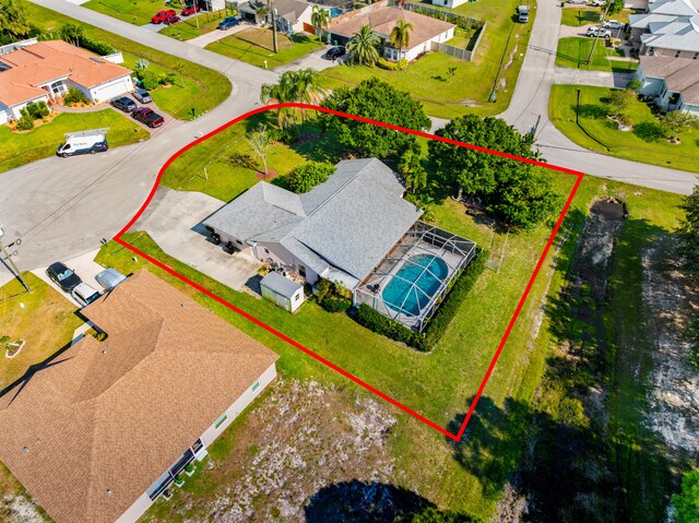 5910 NW Bayou Ct, Port Saint Lucie, FL 34986 - aerial view of residential area featuring property parcel outlined