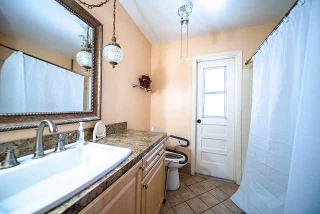4424 Regency Dr, Lake Worth, FL 33461 - bathroom featuring tile patterned floors, toilet, and vanity