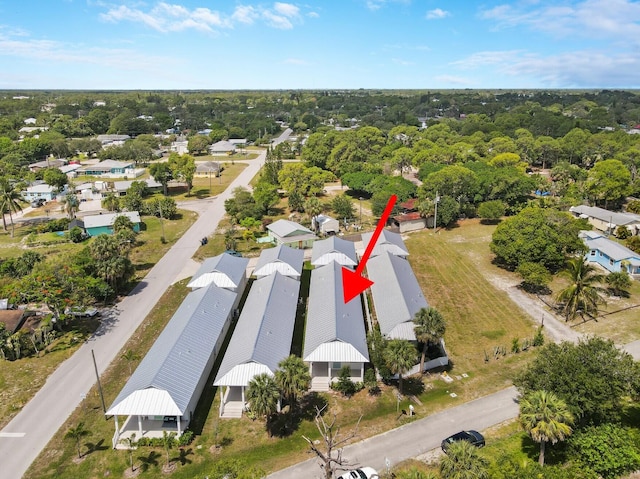 4982 SE Railway Ave, Stuart, FL 34997 - drone / aerial view of a tree filled landscape