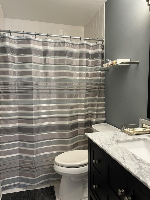 13852 Via Flora Unit A, Delray Beach, FL 33484 - full bath with toilet, vanity, and curtained shower