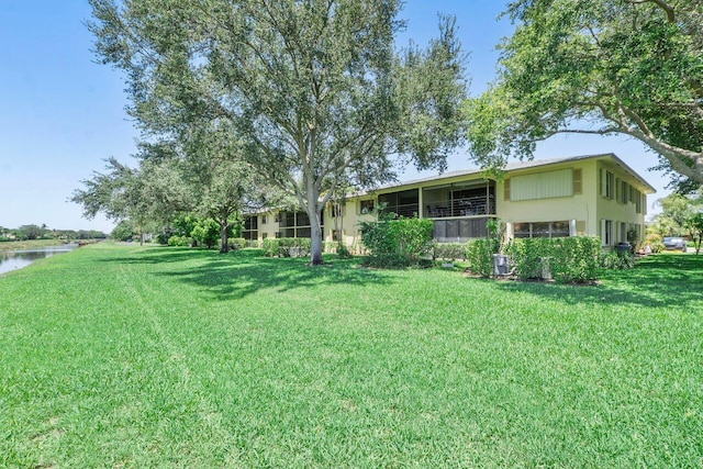 2890 SW 22nd Cir Unit 242B, Delray Beach, FL 33445 - view of grassy yard with a water view