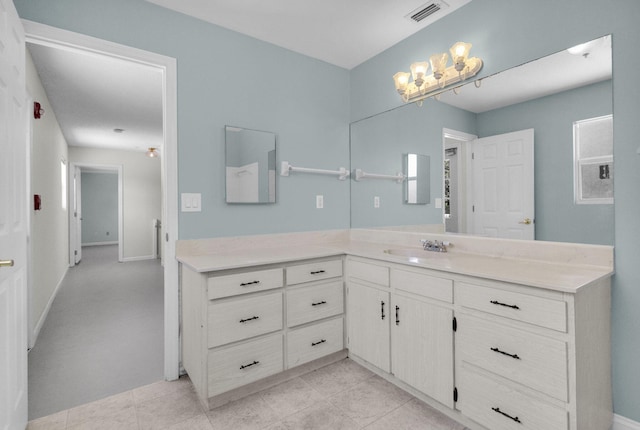 8888 SE Colony St, Hobe Sound, FL 33455 - bathroom featuring vanity and baseboards