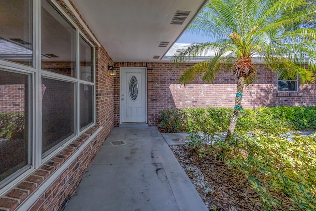 8888 SE Colony St, Hobe Sound, FL 33455 - entrance to property featuring brick siding
