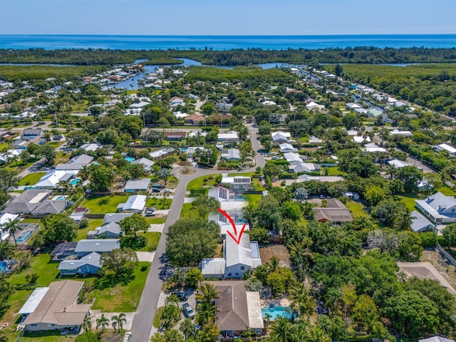 8888 SE Colony St, Hobe Sound, FL 33455 - aerial view of residential area with a large body of water
