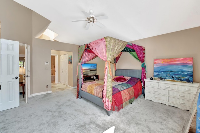 carpeted bedroom with ceiling fan and baseboards