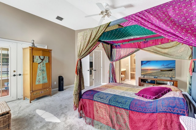 bedroom with carpet flooring, ensuite bathroom, a ceiling fan, and baseboards