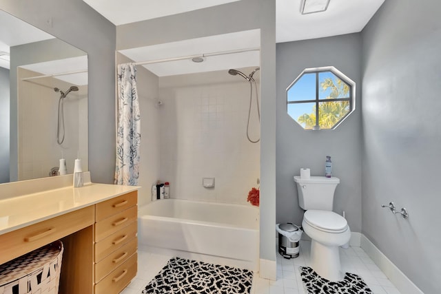 full bathroom with tile patterned flooring, toilet, shower / tub combo with curtain, and vanity
