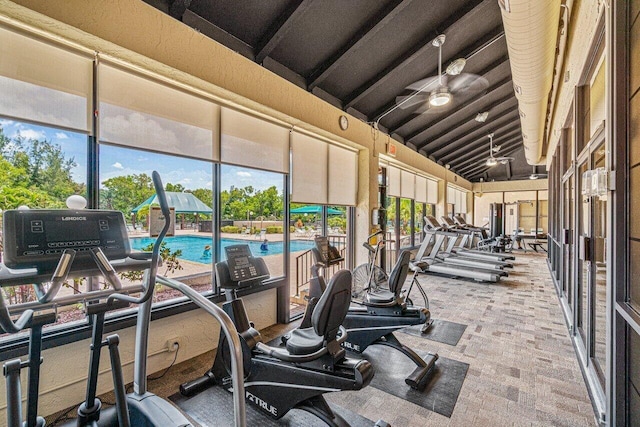 gym featuring lofted ceiling