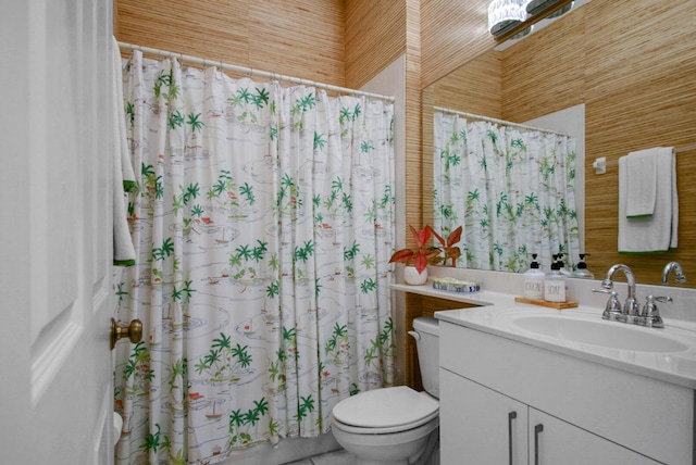 full bathroom featuring toilet, vanity, a shower with shower curtain, and tile patterned flooring