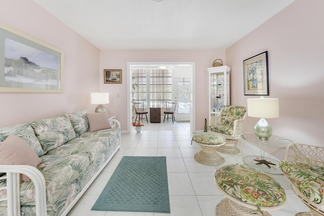 2151 NE 1st Ct Unit 102, Boynton Beach, FL 33435 - living room featuring tile patterned flooring and baseboards