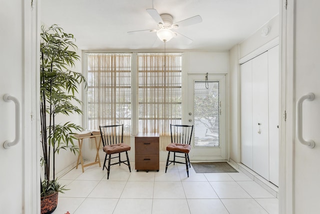 2151 NE 1st Ct Unit 102, Boynton Beach, FL 33435 - sitting room with tile patterned flooring and ceiling fan