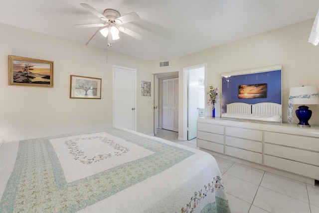 2151 NE 1st Ct Unit 102, Boynton Beach, FL 33435 - bedroom with light tile patterned floors and ceiling fan