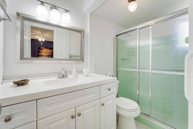 2151 NE 1st Ct Unit 102, Boynton Beach, FL 33435 - bathroom featuring a stall shower, toilet, and vanity