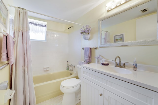 2151 NE 1st Ct Unit 102, Boynton Beach, FL 33435 - bathroom featuring toilet, vanity, shower / tub combo with curtain, and tile patterned flooring