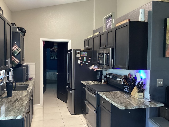 3834 SE 12th Dr, Okeechobee, FL 34974 - kitchen featuring stainless steel appliances and light tile patterned floors