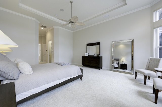 212 Montant Dr, Palm Beach Gardens, FL 33410 - carpeted bedroom with a raised ceiling, ornamental molding, baseboards, ceiling fan, and ensuite bathroom
