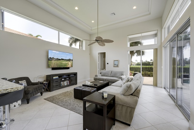 212 Montant Dr, Palm Beach Gardens, FL 33410 - living room with a towering ceiling, light tile patterned floors, a tray ceiling, ceiling fan, and recessed lighting