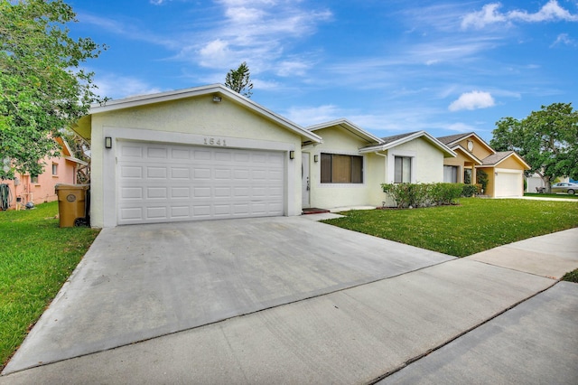 1541 SW 102nd Ter, Davie, FL 33324 - single story home with stucco siding, a front yard, driveway, and an attached garage