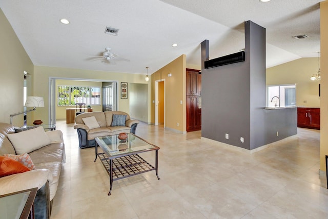 1541 SW 102nd Ter, Davie, FL 33324 - living room with ceiling fan, lofted ceiling, recessed lighting, and baseboards