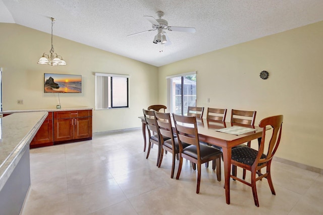 1541 SW 102nd Ter, Davie, FL 33324 - dining room with lofted ceiling, a ceiling fan, a chandelier, a textured ceiling, and baseboards