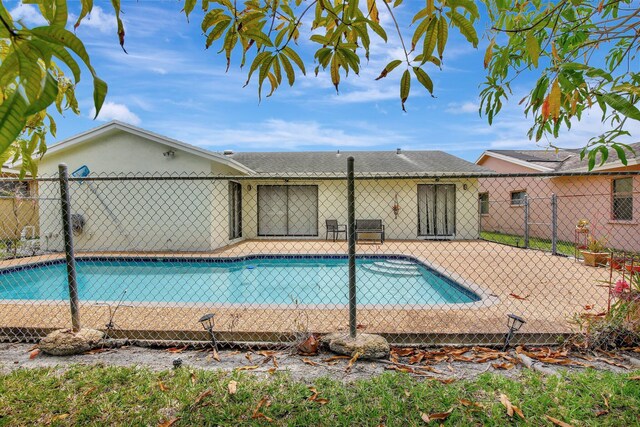 1541 SW 102nd Ter, Davie, FL 33324 - view of swimming pool with a patio