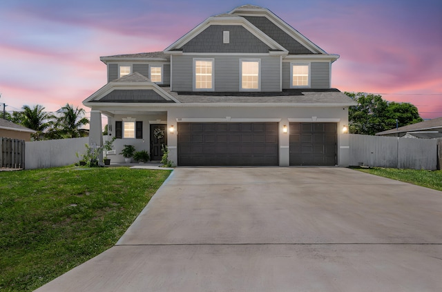 412 SW Dailey Ave, Port Saint Lucie, FL 34953 - view of front of home with concrete driveway and a garage