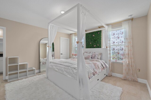 412 SW Dailey Ave, Port Saint Lucie, FL 34953 - bedroom featuring baseboards
