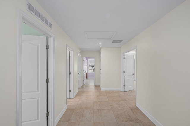 412 SW Dailey Ave, Port Saint Lucie, FL 34953 - hall with baseboards, attic access, and recessed lighting