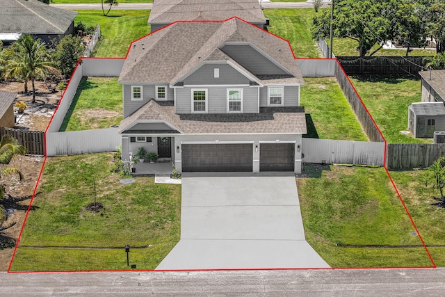 412 SW Dailey Ave, Port Saint Lucie, FL 34953 - view of front of property featuring a garage, roof with shingles, and concrete driveway