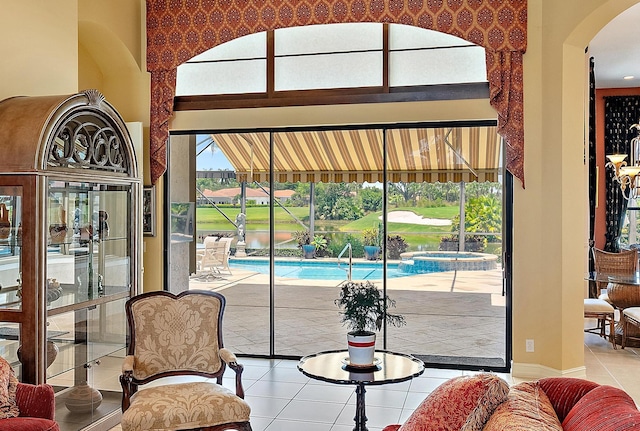 7731 Blue Heron Way, West Palm Beach, FL 33412 - tiled living room with arched walkways