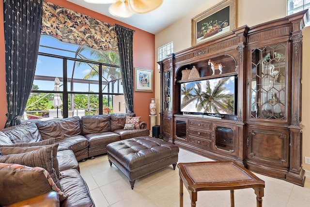 7731 Blue Heron Way, West Palm Beach, FL 33412 - living area with light tile patterned floors and a towering ceiling