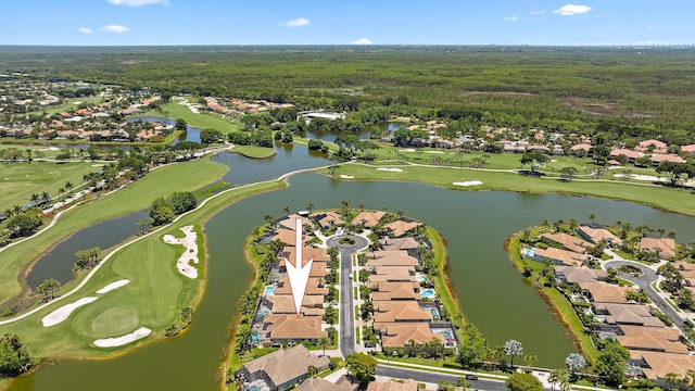 7731 Blue Heron Way, West Palm Beach, FL 33412 - aerial overview of property's location featuring nearby suburban area, a golf course, a heavily wooded area, and a nearby body of water